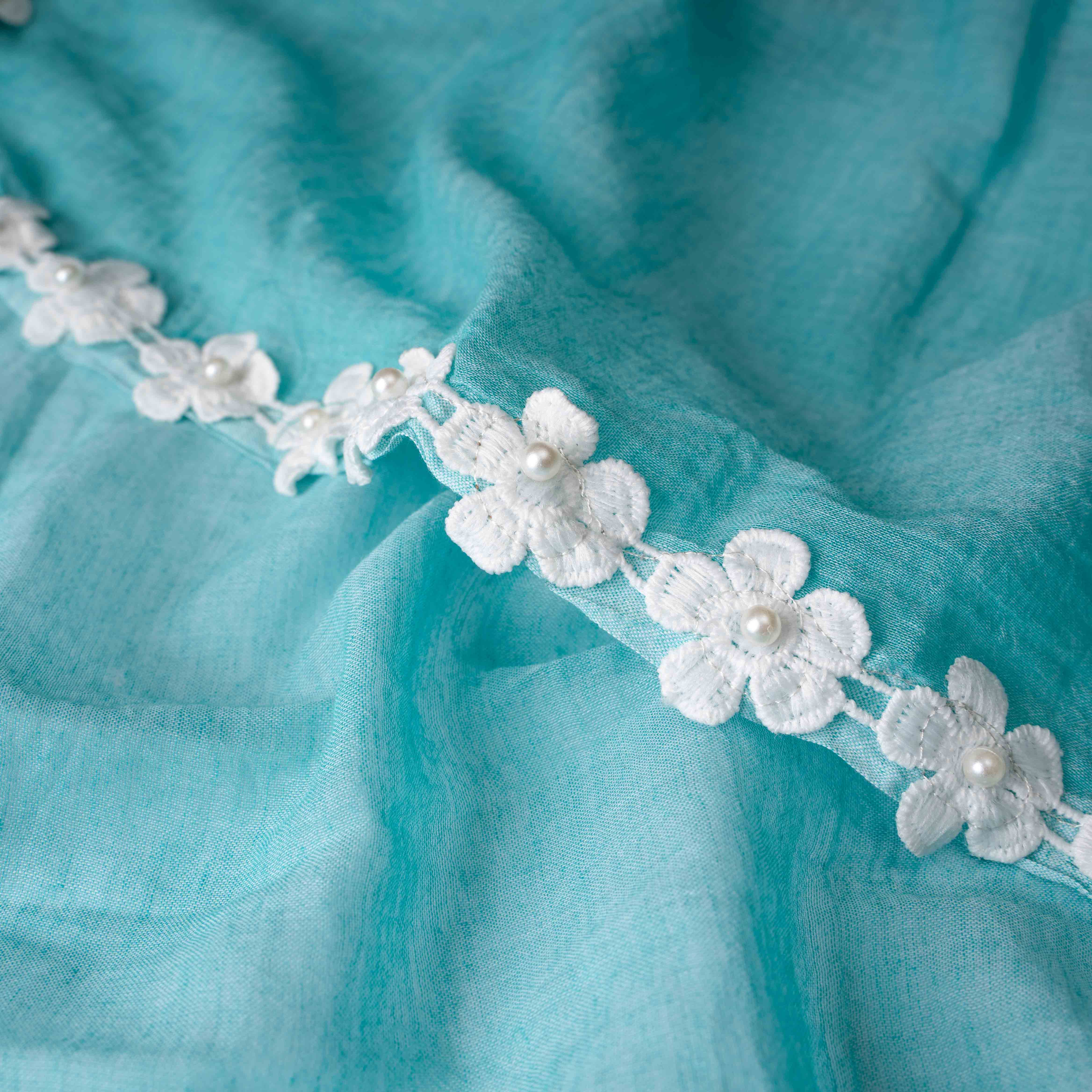 Ultra-soft Mint Green Mul Cotton Saree with Floral Applique