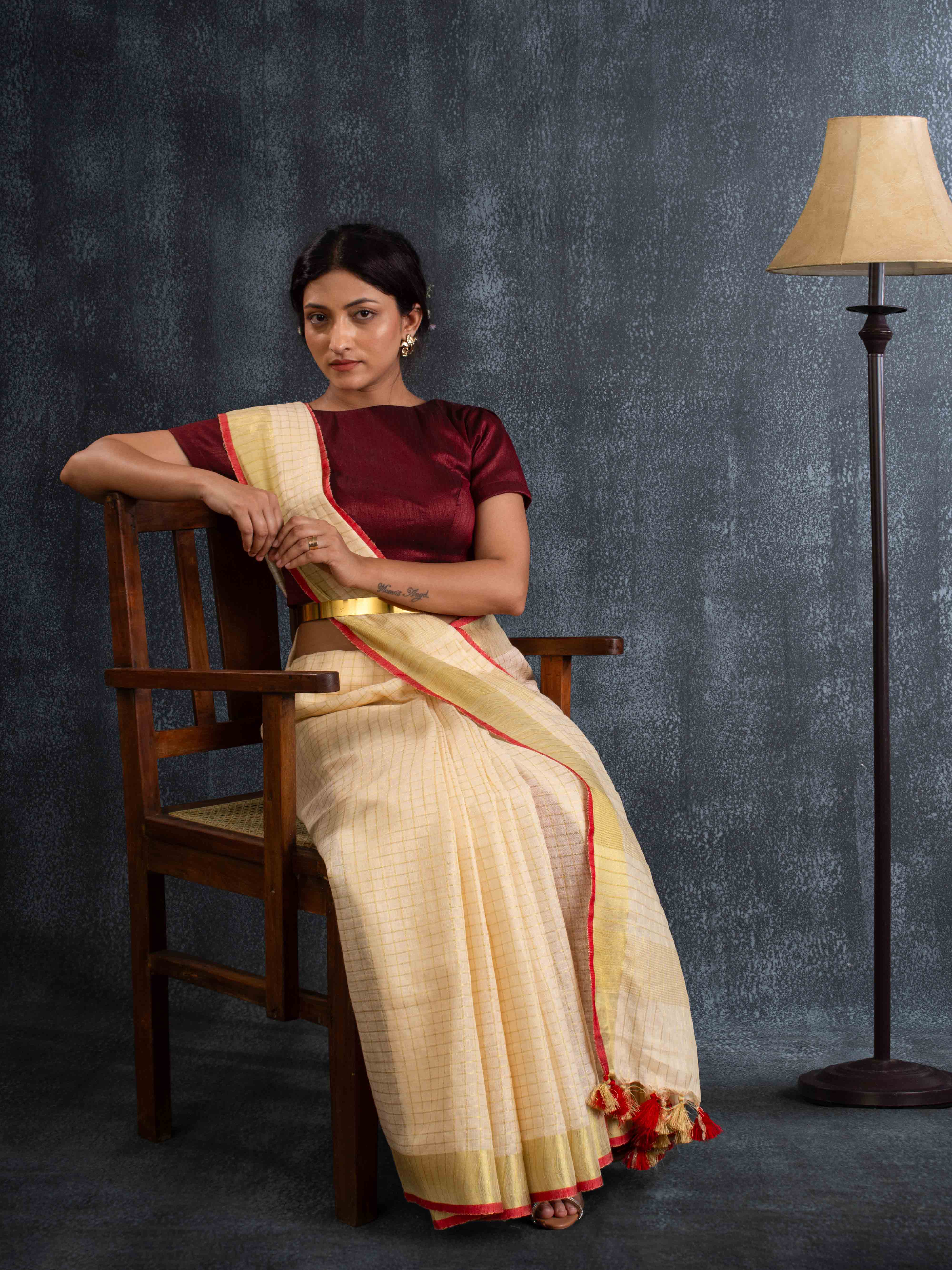 Cloud-like Self-Weave Textured Linen Saree in Cream with Gold Border