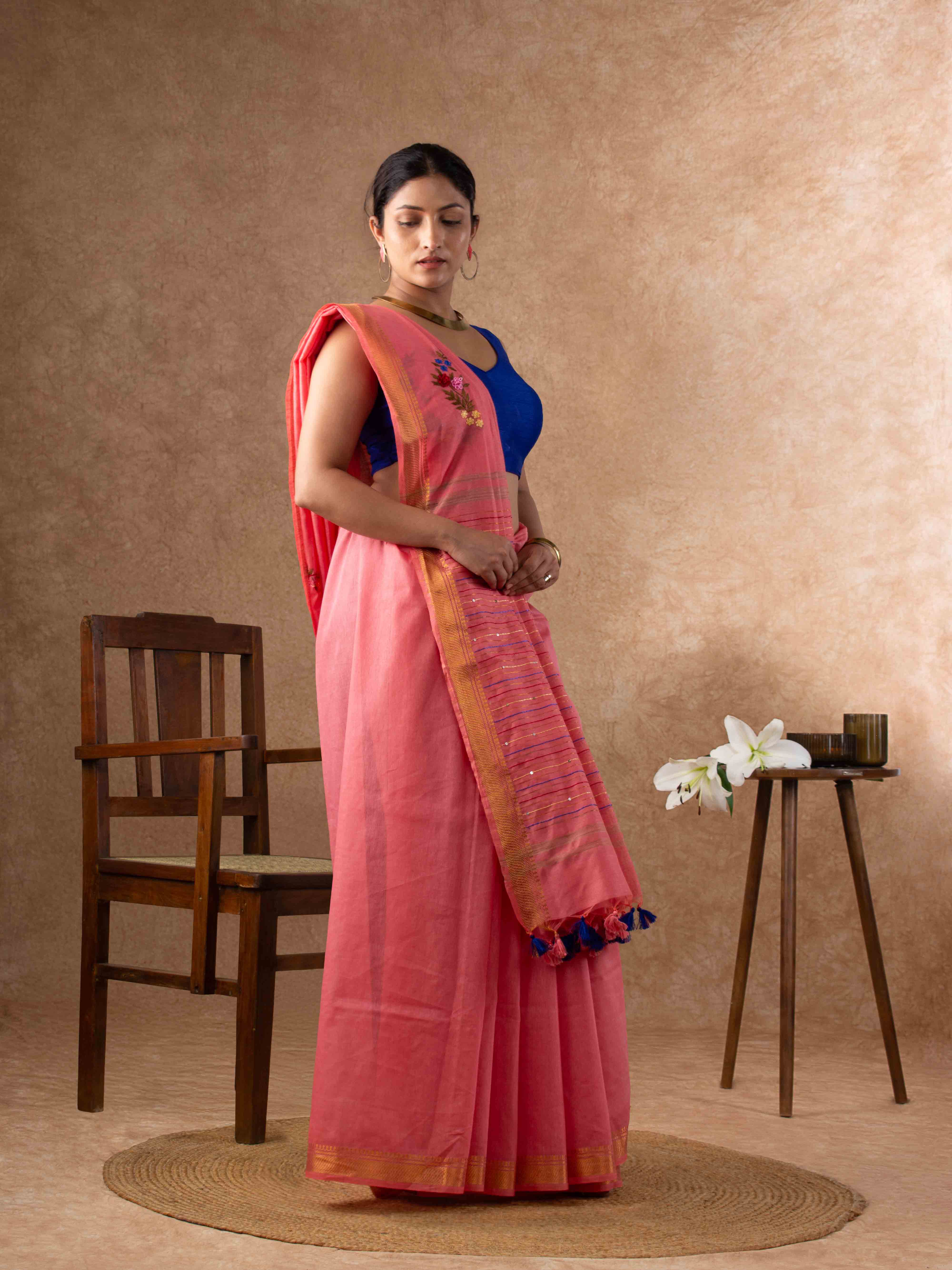 Velvety Linen Silk Saree in Coral Pink with Floral Embroidery