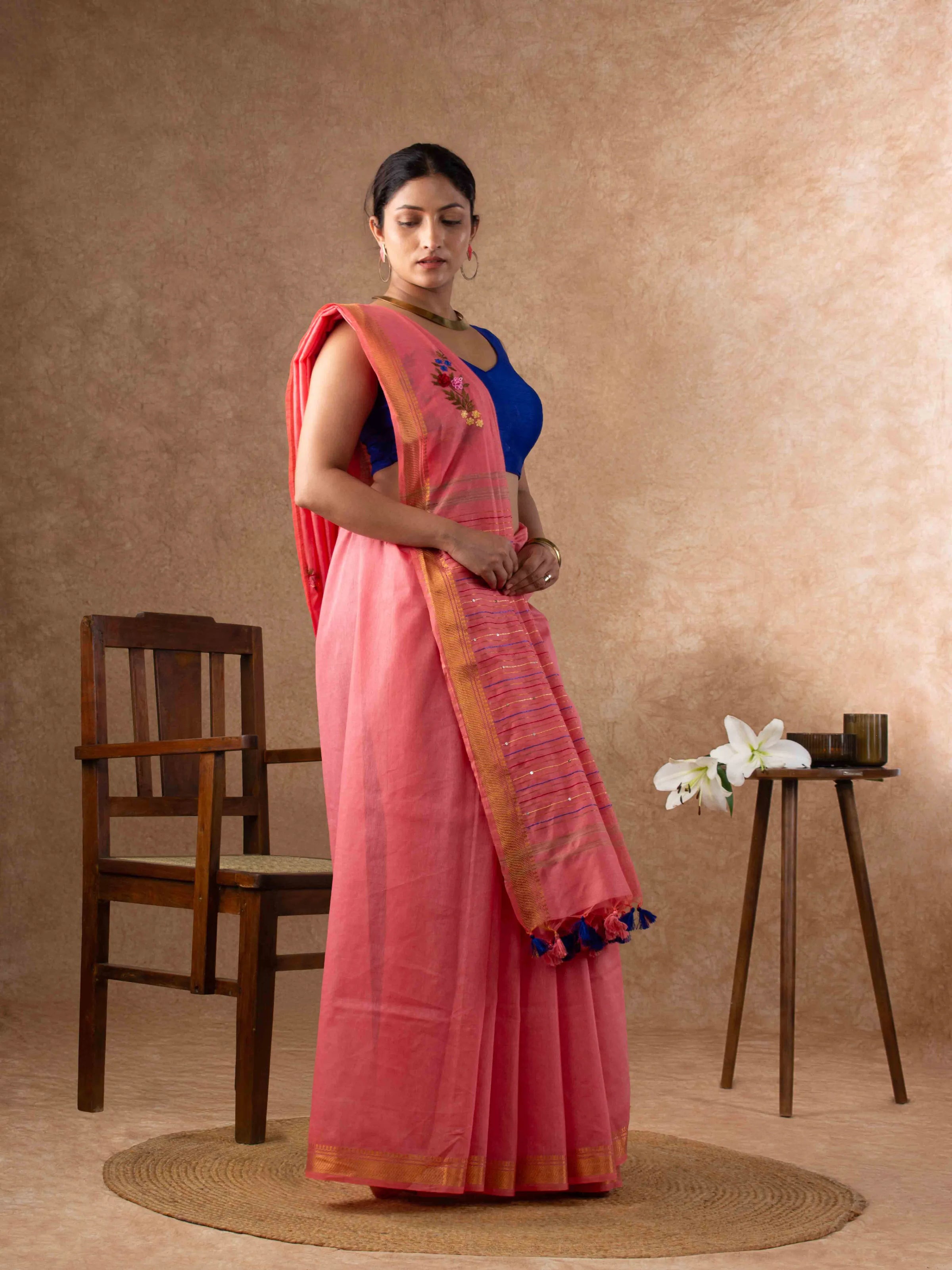 Velvety Linen Silk Saree in Coral Pink with Floral Embroidery