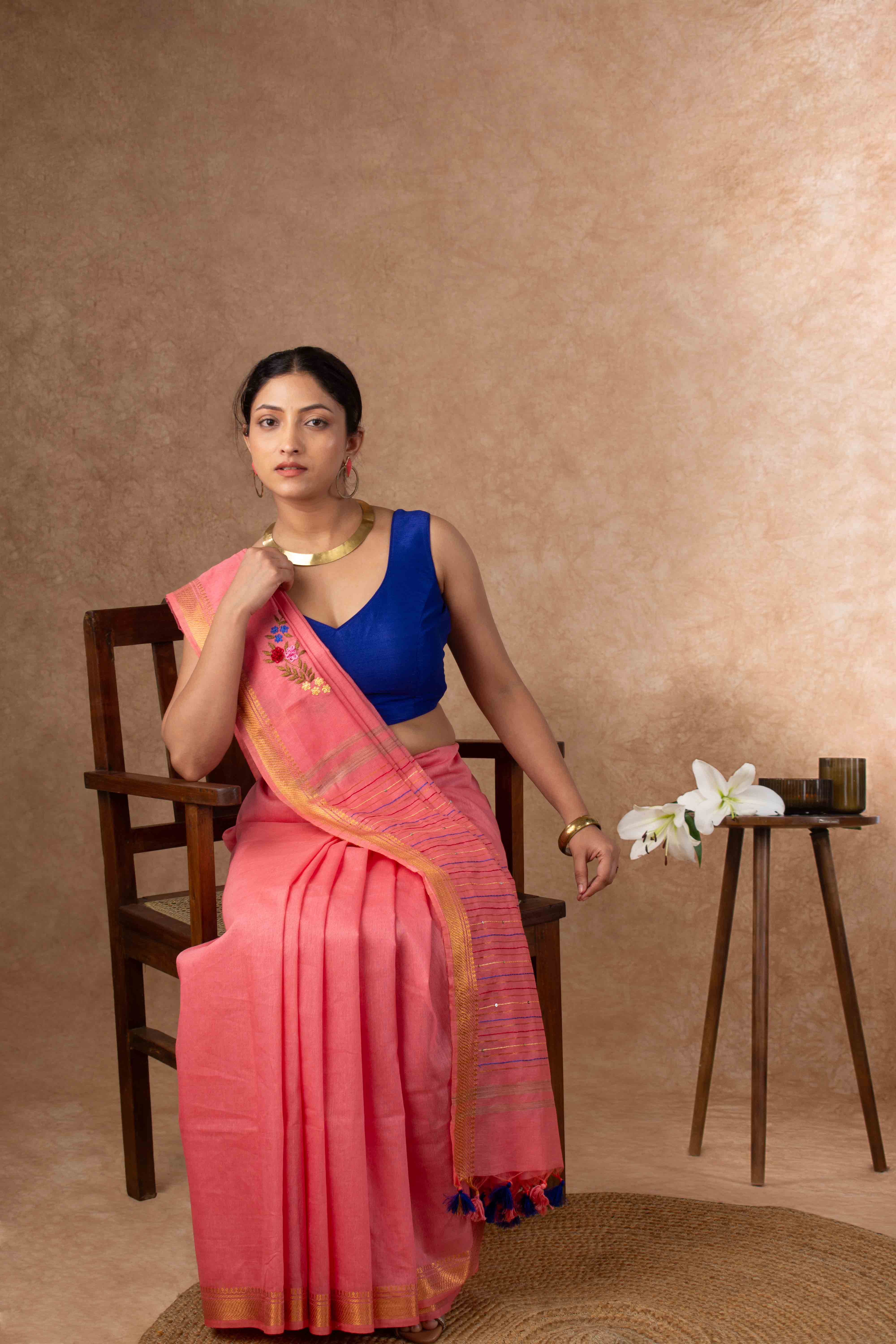 Velvety Linen Silk Saree in Coral Pink with Floral Embroidery