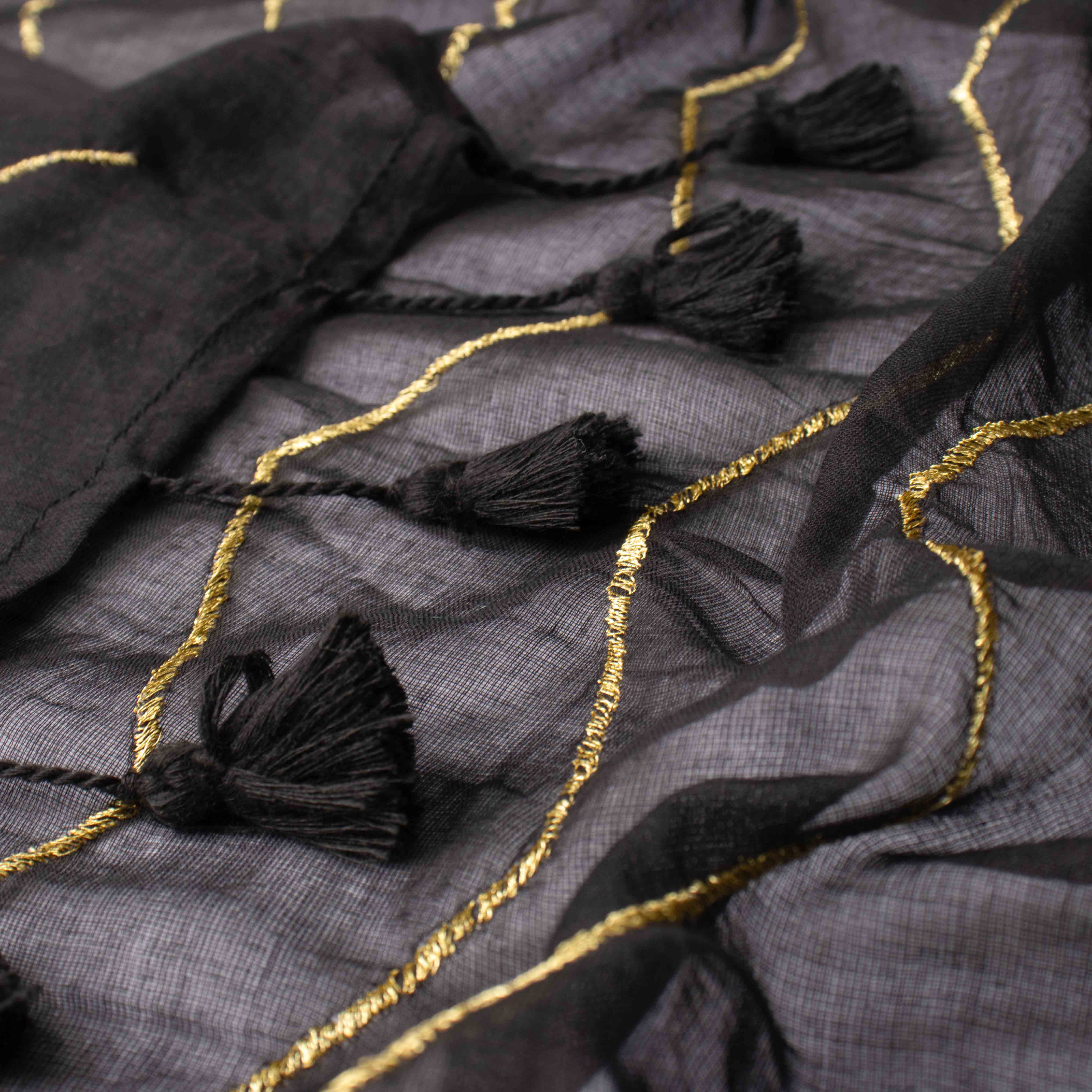 Featherlight Mul Cotton Saree in Black with Wave Patterns