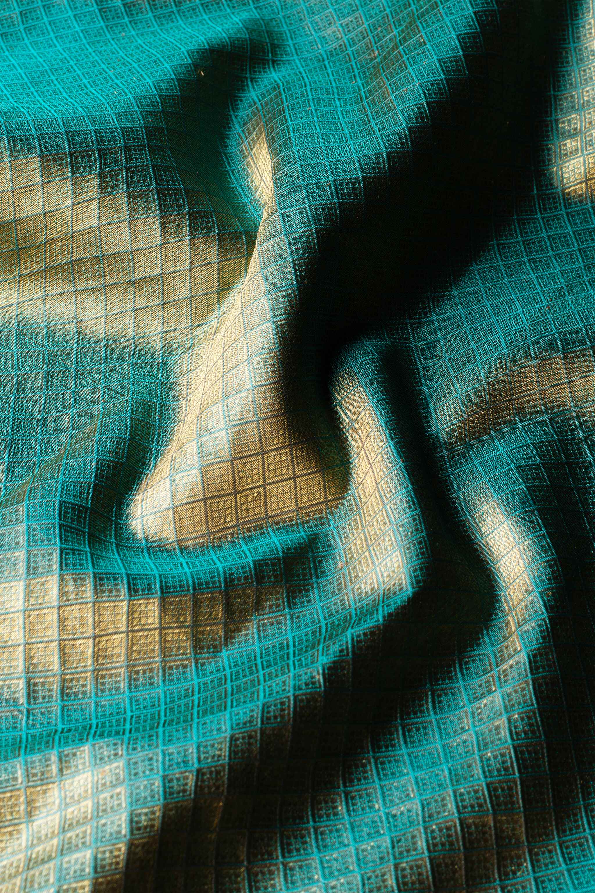 'Kshama' Brown and Teal Kanjeevaram Silk Saree
