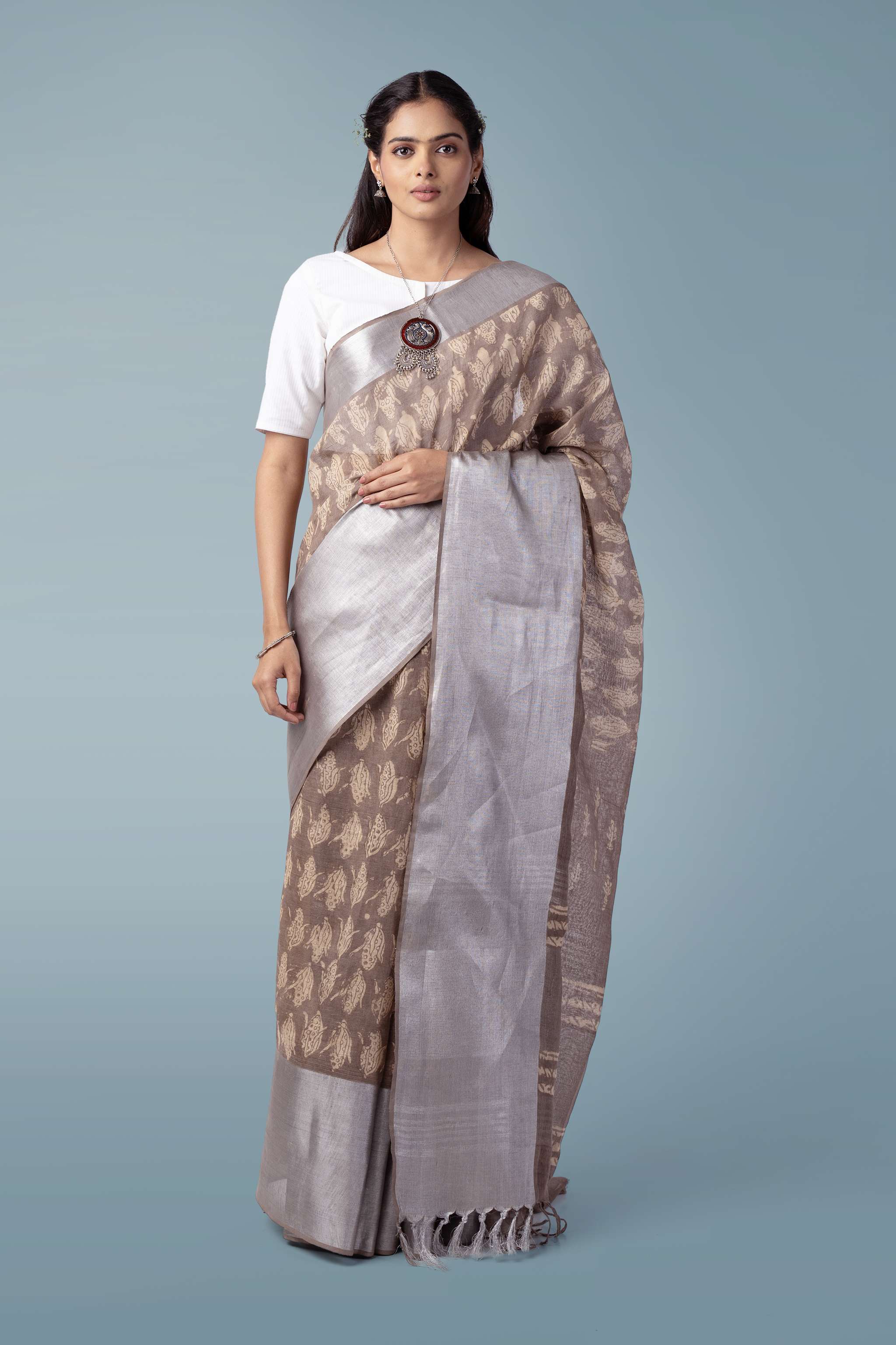 Deep Clay Pure Linen Handwoven Saree | Shahi Dabu Print