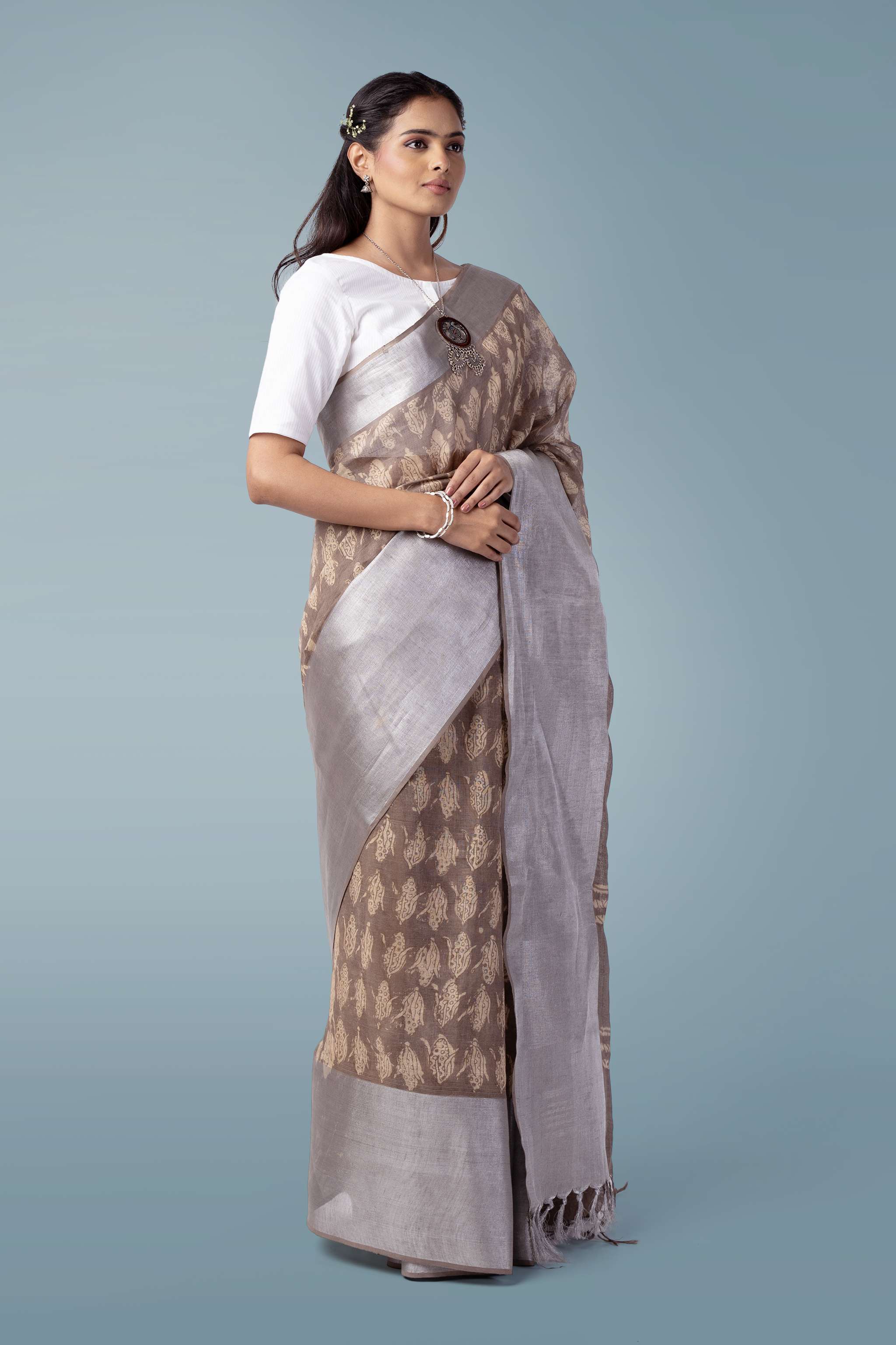 Deep Clay Pure Linen Handwoven Saree | Shahi Dabu Print