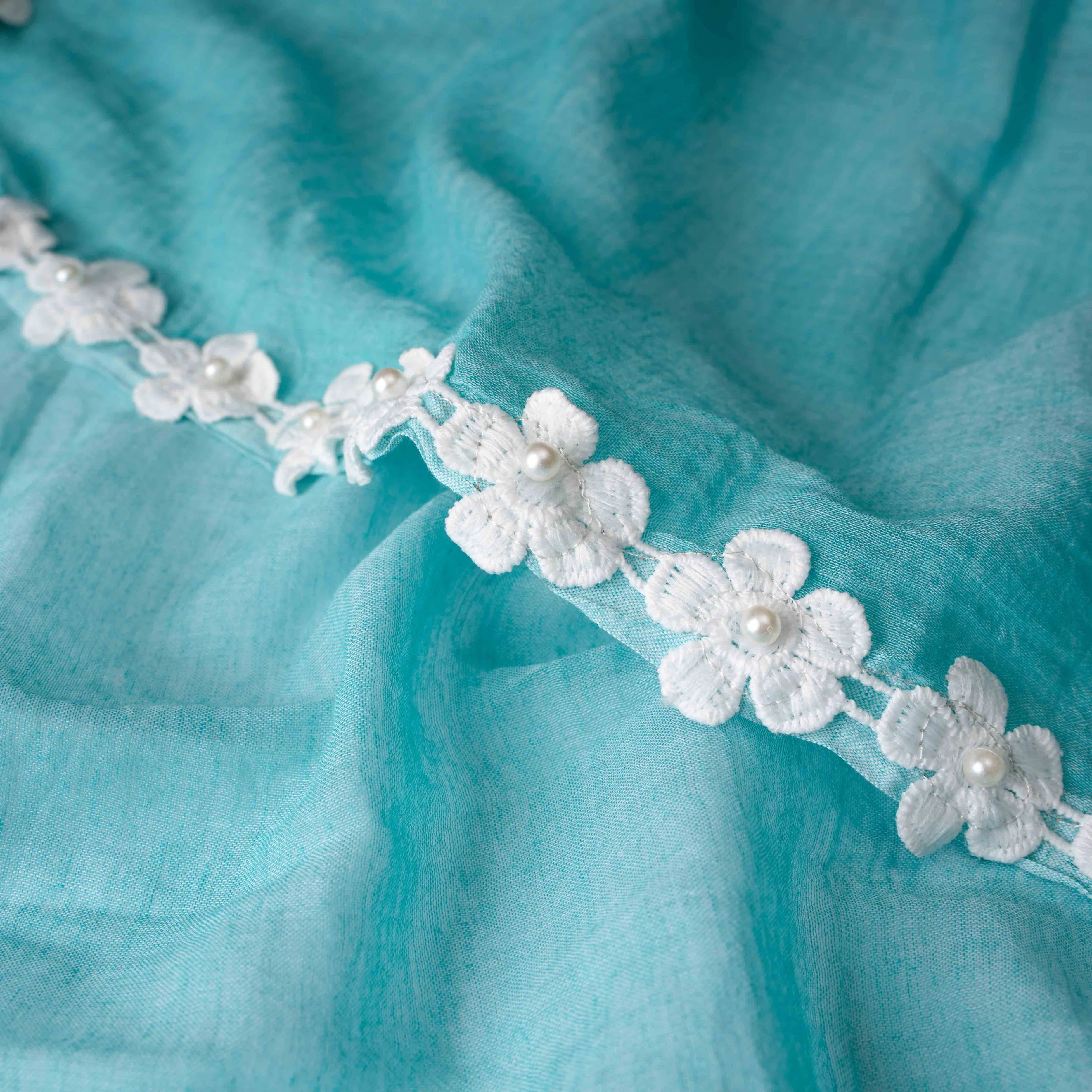 Ultra-soft Mint Green Mul Cotton Saree with Floral Applique