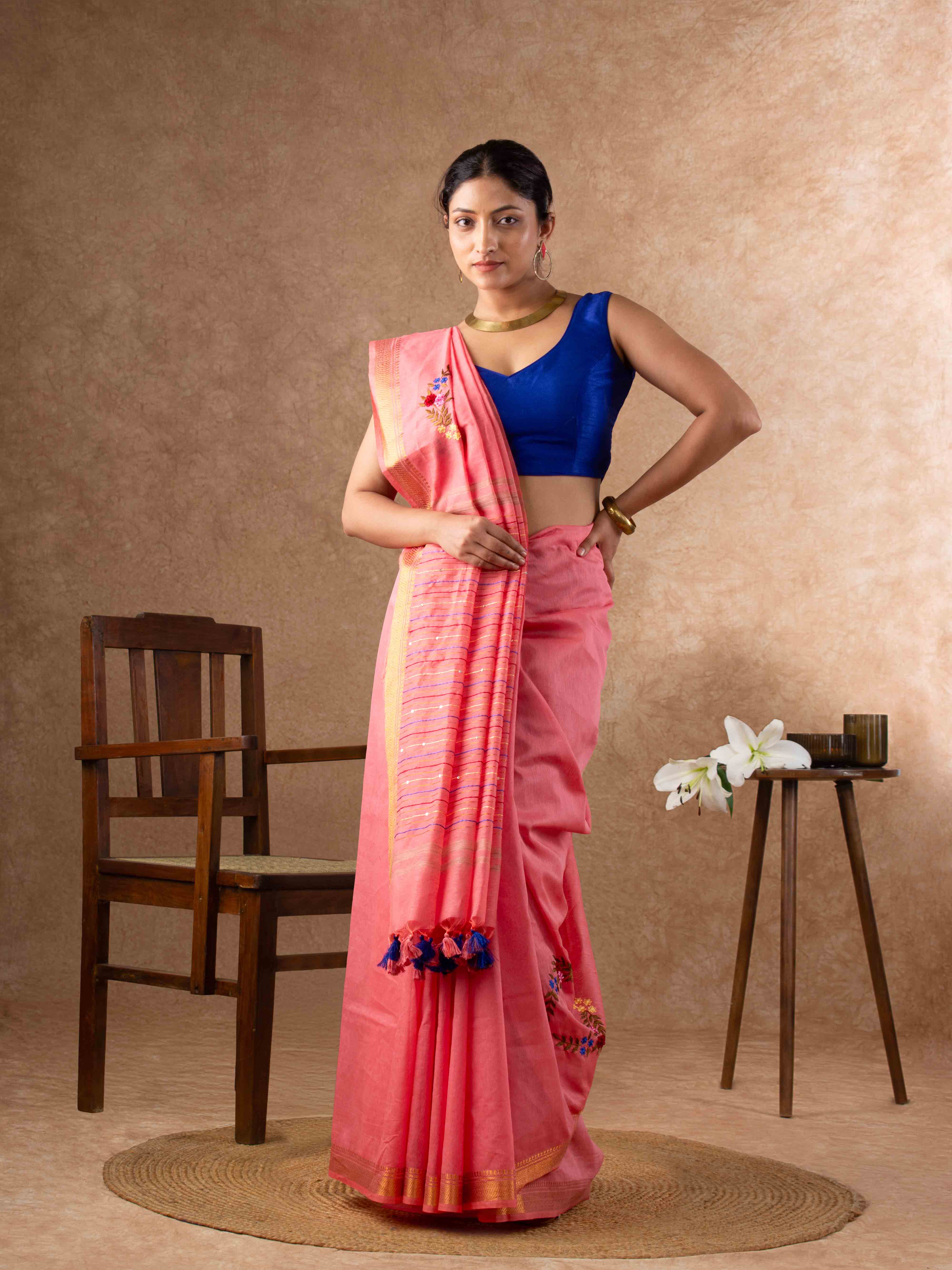 Velvety Linen Silk Saree in Coral Pink with Floral Embroidery