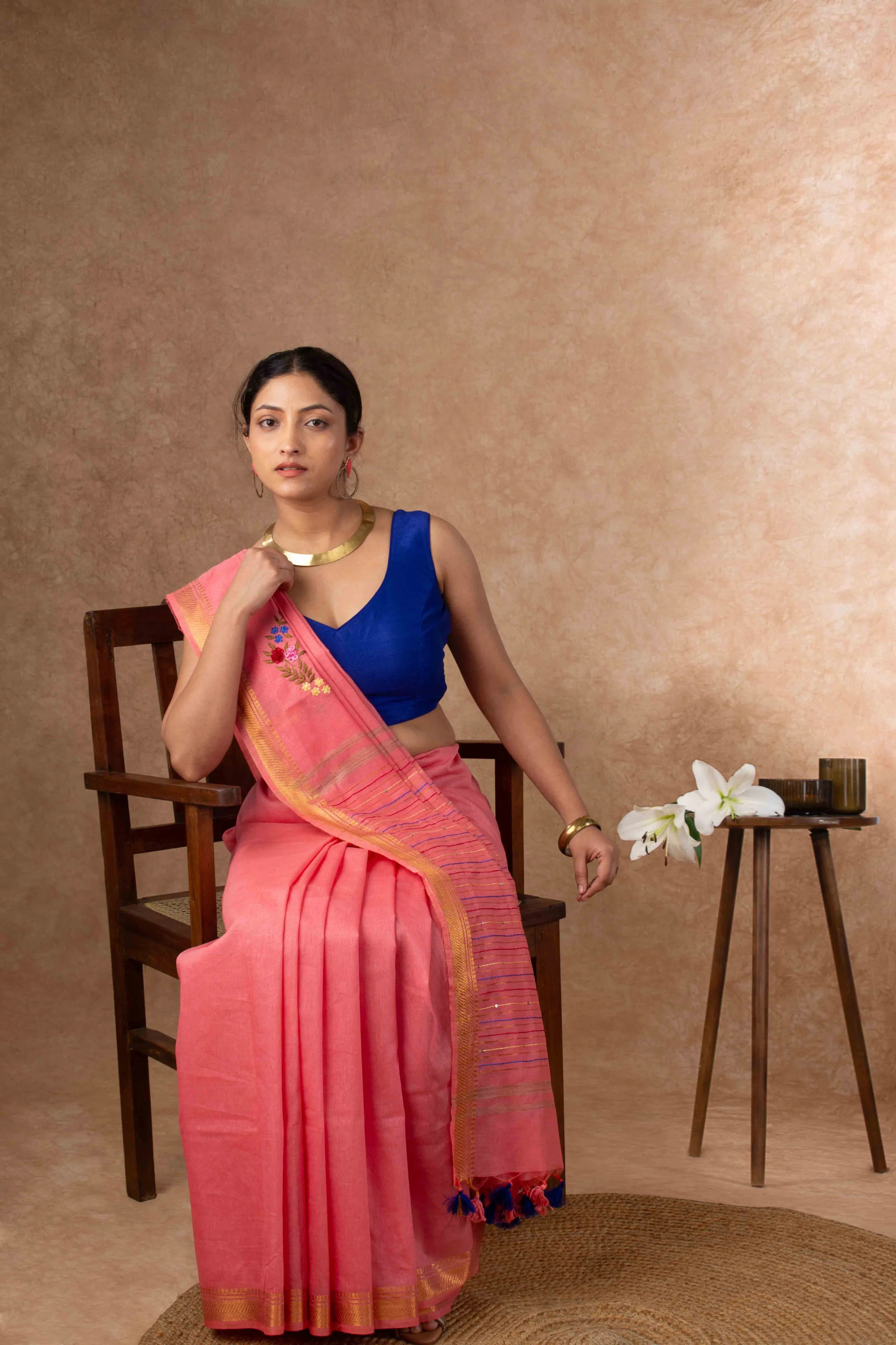 Velvety Linen Silk Saree in Coral Pink with Floral Embroidery
