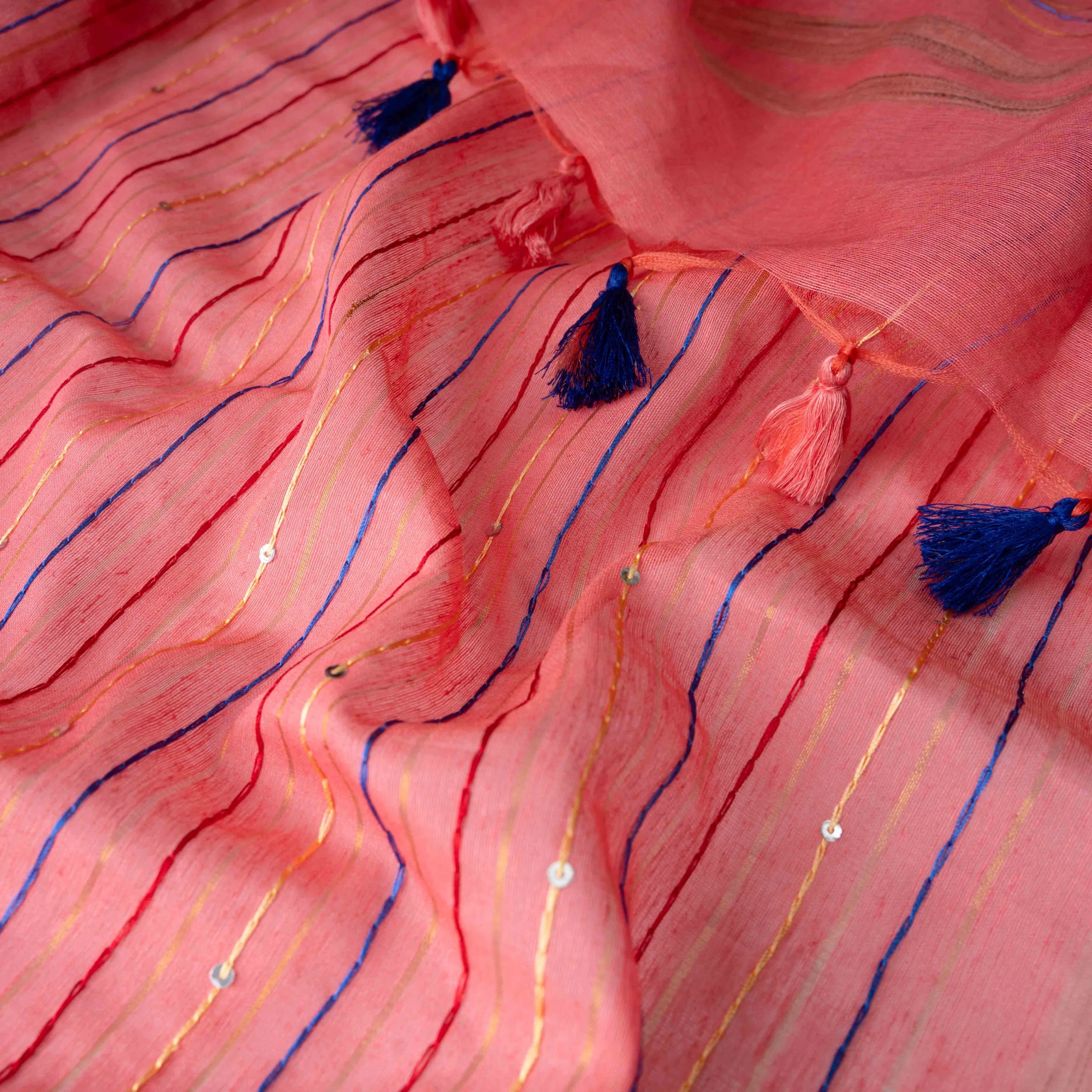 Velvety Linen Silk Saree in Coral Pink with Floral Embroidery